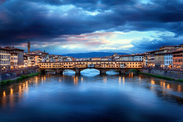 Fototapeta premium A bridge spans a river in a city with a cloudy sky. The bridge is lit up at night, creating a serene and peaceful atmosphere