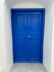 blue door in a wall