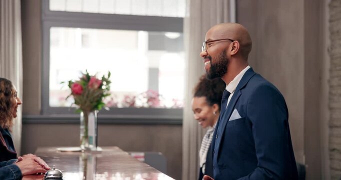 Hotel, employees and guest at reception for check in, hospitality and accommodation with tourism. Vacation, people and worker with luxury, industry and service with paperwork, concierge and holiday