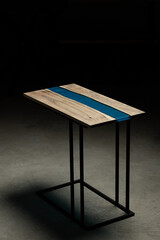 Expensive vintage furniture. The table is covered with epoxy resin and varnished. Luxury quality...
