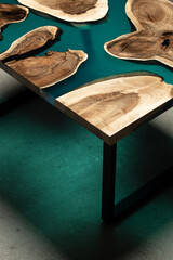 Expensive vintage furniture. The table is covered with epoxy resin and varnished. Luxury quality...