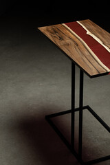 Expensive vintage furniture. The table is covered with epoxy resin and varnished. Luxury quality...