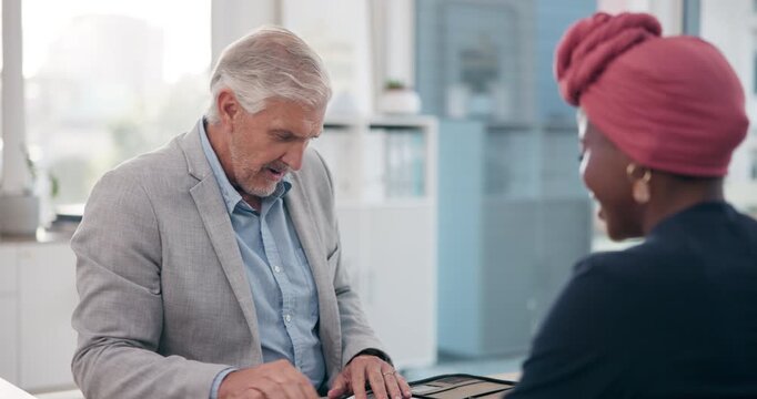 Mature businessman, handshake and interview in office with female candidate, welcome or onboarding in company. Recruitment, male CEO or hand gesture at desk for discussion, cv or question in law firm