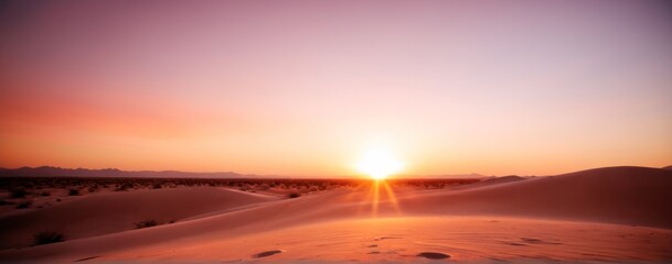  a sunset over the desert with ,