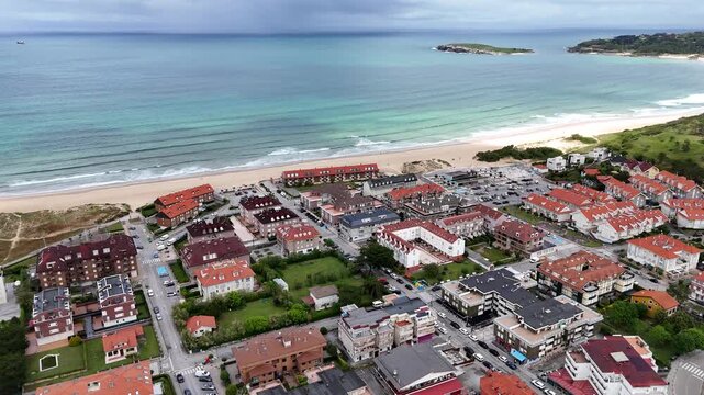 Somo Northern Spain pull back drone aerial reverse reveal