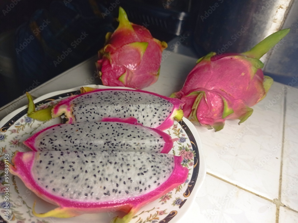 Wall mural dragon fruit on a plate