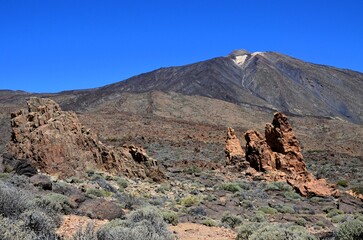 Scenic view of volcanic rock formations in desert during sunny day, Teide National Park, Tenerife