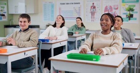 Education, happy and students at school for class, fun lesson and positive reinforcement. People, laugh or biology lecture in classroom with knowledge, growth or development with information for exam