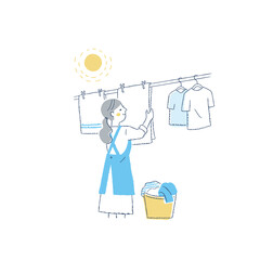 洗濯物を干している女性