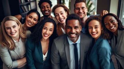 A diverse group of happy office workers posing 