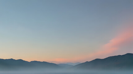 Fototapeta premium hazy sky over a lake with a boat in the water