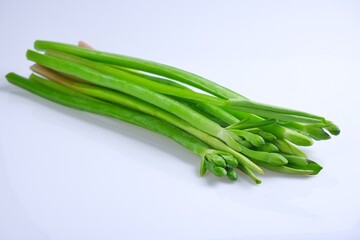 Green leaves and bouquet of yellow burhead or (limnocharis flava (l.) buchenau) isolate on white background.