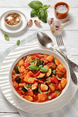 hearty italian vegetable stew in bowl, top view