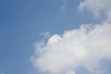 
Blue sky and white puffy clouds