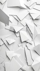 Various white paper shapes are scattered on a light surface, creating an abstract and artistic arrangement