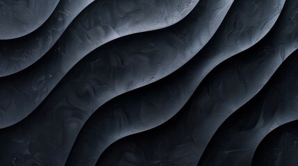 Obraz premium A black edgy background. Wavy shapes out of smooth flowing black textured paper pulp.