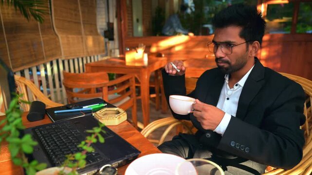 Corporate Person in online Meeting While Smoking