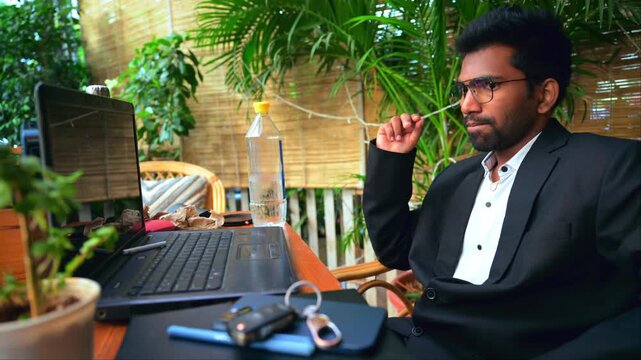 Corporate Man Sits upset At Workplace