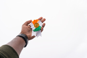 Hand holding India Independence day badge, 78th Independence day background