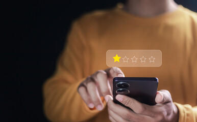 Customer Experience dissatisfied concept, Customer gave 1 star rating in online survey, Bad review, bad service dislike bad quality, low rating, social media not good.