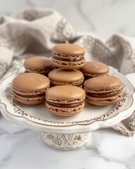 Savor hazelnut macarons with rich ganache filling, beautifully arranged on a dessert platter.