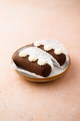 Homemade cocoa dessert with vanilla cream