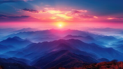 Obraz premium sunset over a long mountain range, yellow, pink, red, orange. blue, purple