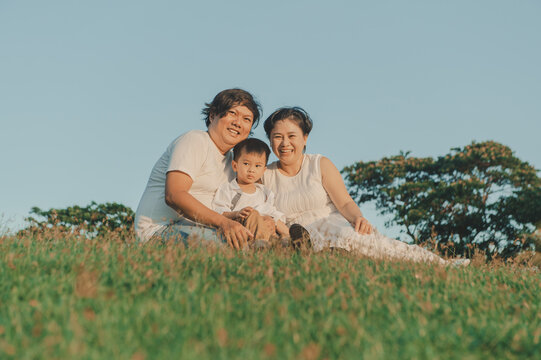 Happy Asian Family in the park