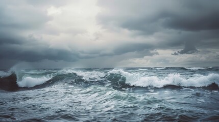 Naklejka premium Choppy seas under a grey, overcast sky, portraying the intensity and vastness of the ocean amidst unsettling weather.