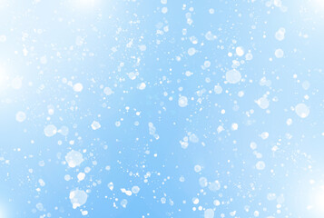  White Bokeh Light Effects on Blue winter Background.