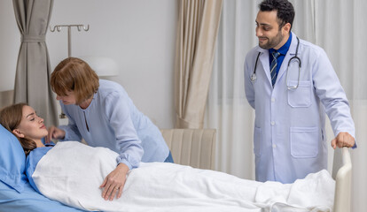 Obraz premium Doctor and Mother Supporting Hospitalized Patient