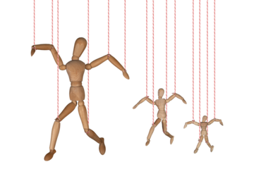 Wooden puppet doll, dancing marionette. Concept of emotional manipulation, world conspiracy theories
