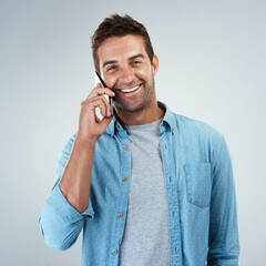 Phone call, smile and portrait of man in studio on white background for communication or conversation. Contact, hello and service with happy person speaking on mobile for chatting or networking