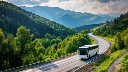 White modern tourist bus on a beautiful highway in the mountains. Travel and bus tourism concept.