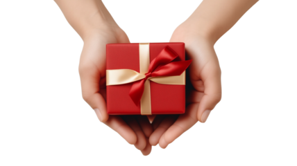 Close-up of a hands holding a small gift box, isolated on transparent background, top view