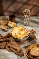 Cassava chips, a traditional Indonesian snack, are made from thin slices of cassava and then dry fried sprinkled with salt