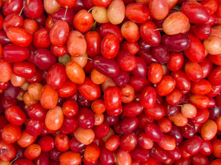 ripe red cranberry fruit background or surface
