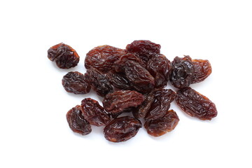 Dried grapes on white background