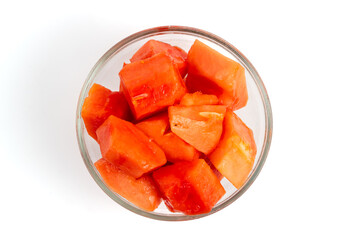 papaya slices in clear bowl isolated white background. Perfect for design element, product packaging, promotion, or any commercial purposes.