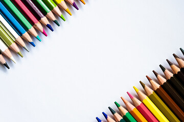 Colored pencils isolated on white background