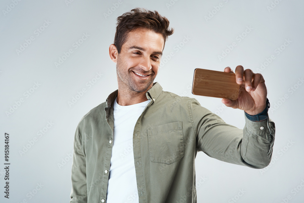Poster fashion, selfie and smile with man in studio on white background for post or status update. app, mob