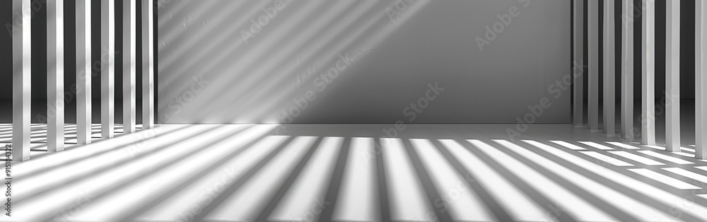 Poster sunlight shines through a white slatted fence, casting long, parallel lines of shadow onto a white s