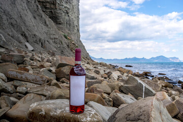 Bottle of wine by the sea