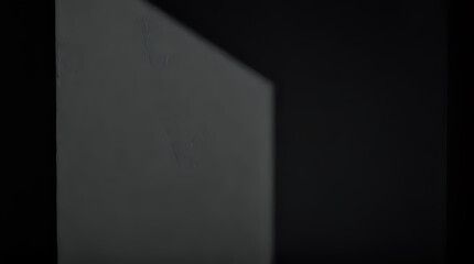 a clock on a wall in a dark room