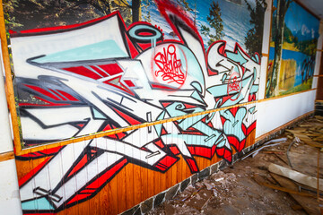 Graffiti on the wall of a vandalized room of an abandoned hotel. Abandoned hotel. Hotel Neptuno. Tenerife, Bajamar, Canary Islands.