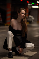 woman posing on the underground parking