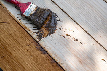 wooden background pine surface, slanted, walnut color, brown, top view of surface protection...