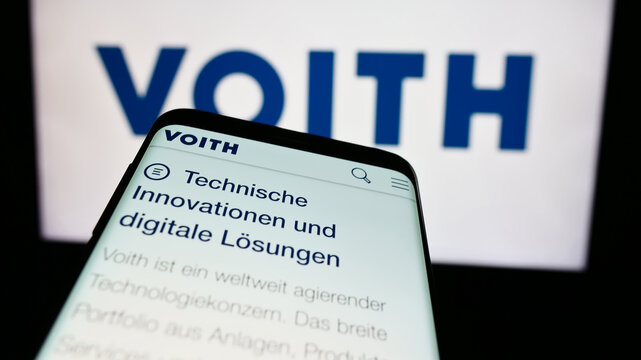 Stuttgart, Germany - 08-02-2024: Smartphone with website of German technology company Voith GmbH Co. KGaA in front of business logo. Focus on top-left of phone display.