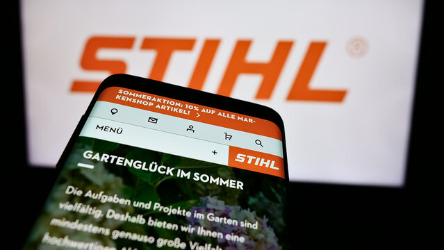 Stuttgart, Germany - 08-02-2024: Smartphone with website of German power equipment company Stihl Holding AG Co. KG in front of business logo. Focus on top-left of phone display.