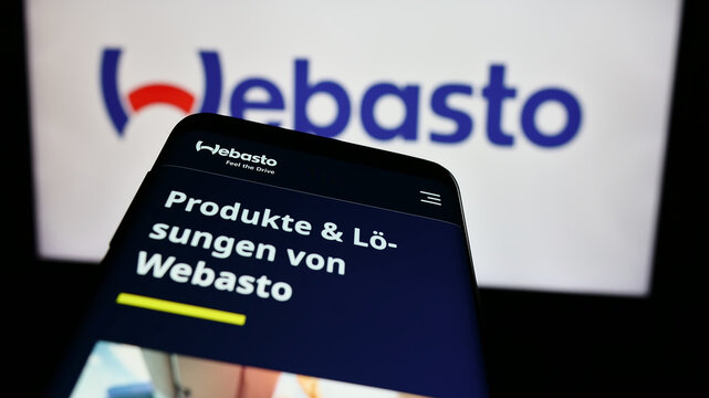 Stuttgart, Germany - 08-05-2024: Mobile phone with website of German automotive company Webasto SE in front of business logo. Focus on top-left of phone display.